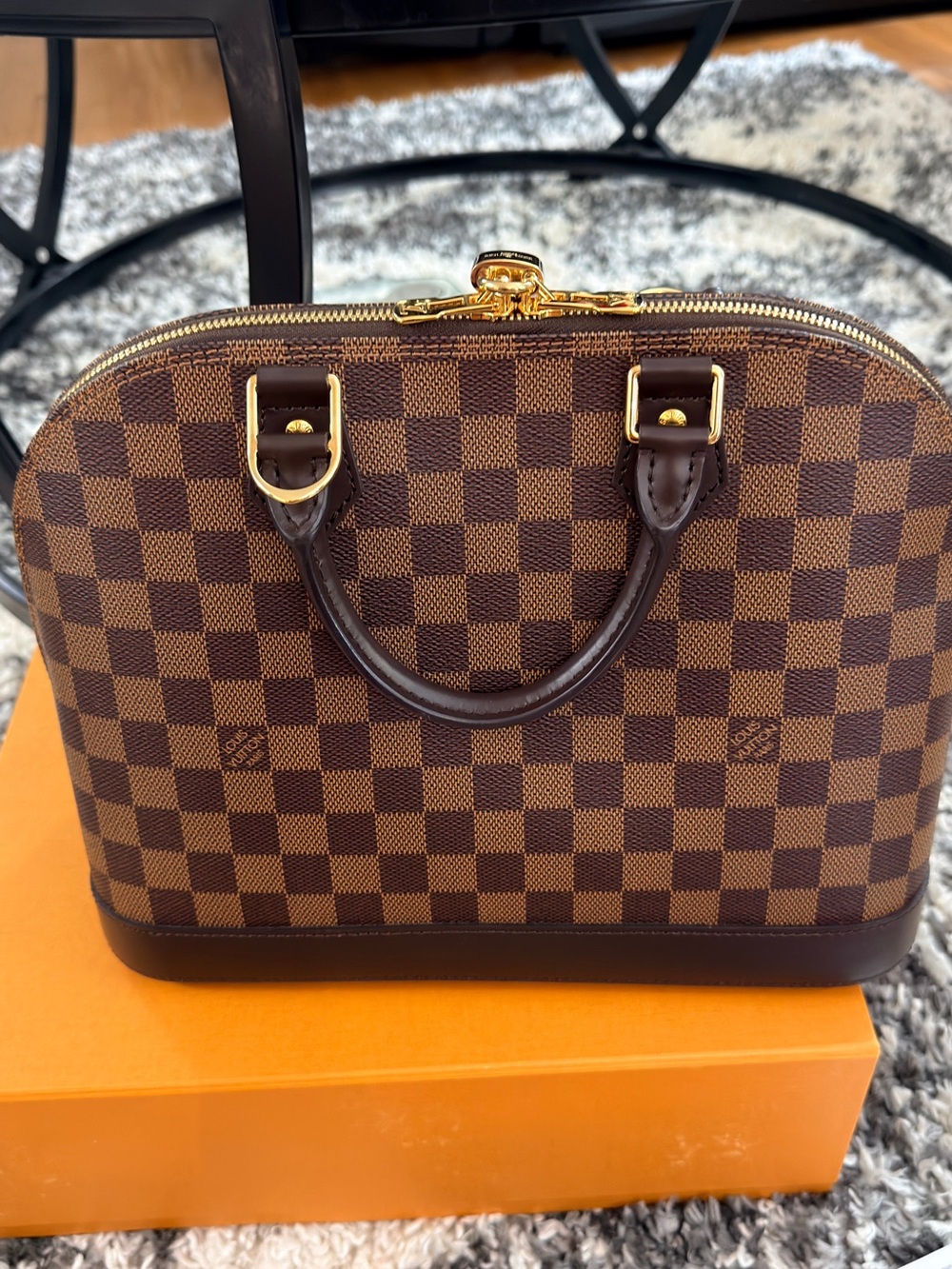 Louis Vuitton Brown Damier Ebene Alma Handbag with Gold Hardware